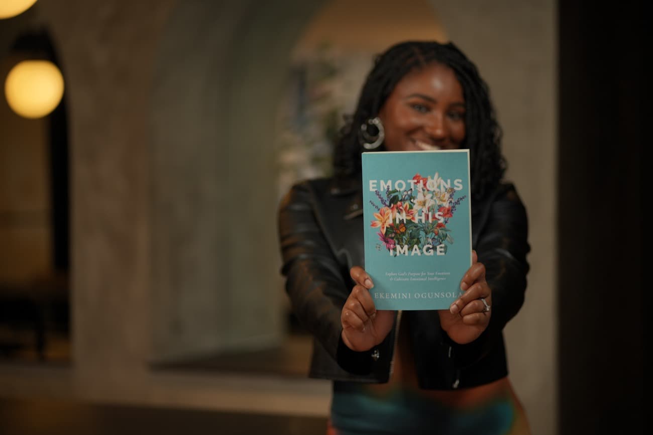 Ekemini Ogunsola holding her book